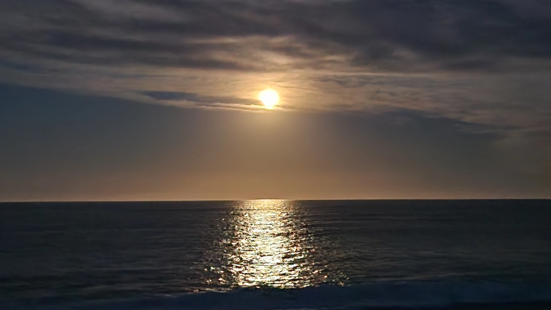 An Evening Surfcasting Session Under a Full Moon